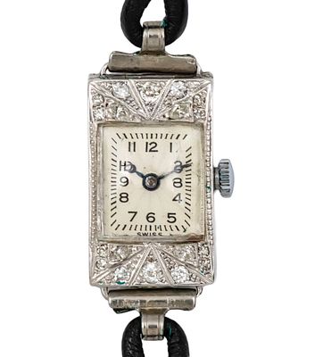 שעון יד לאישה Rolex ארט-דקו זהב לבן 18 קראט ויהלומים. 
מנגנון מכני, מצב עבודה. 
מארז (קייס) זהב 