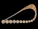 18k Yellow Gold Diamond Brooch. 
29 diamonds in total weight of about 4ct. 
Marked. 
5.6x2.9cm. Image - 1