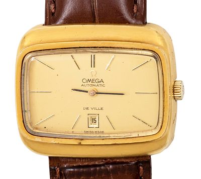 שעון יד Omega De Ville. 
מנגנון אוטומטי, מצב עבודה. 
תאריך. 
מארז (קייס) מצופה זהב. 
רצועת 