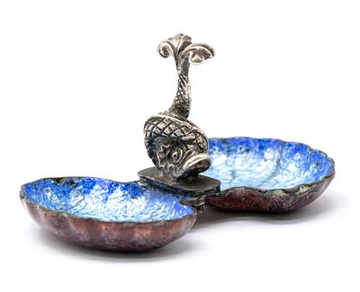 Silver and Enamel Double Salt Cellar. 
Modeled with sculptured fish in the center, two shell 