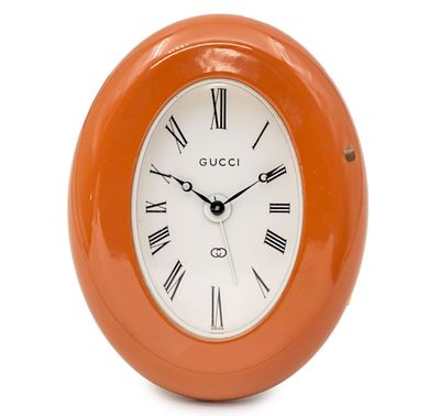 Gucci Table Alarm Clock. 
Mechanical movement, eight days, working condition. 
Alarm movement 