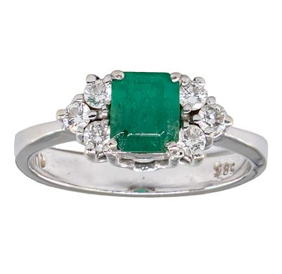 14k White Gold Diamond and Emerald Ring. 
Emerald - 6.2x5.3mm. 
Six diamonds in total weight 