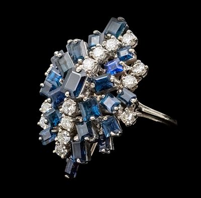 14k White Gold Diamond and Sapphire Ring. 
14 diamonds in total weight of about 1.10ct. 
23 