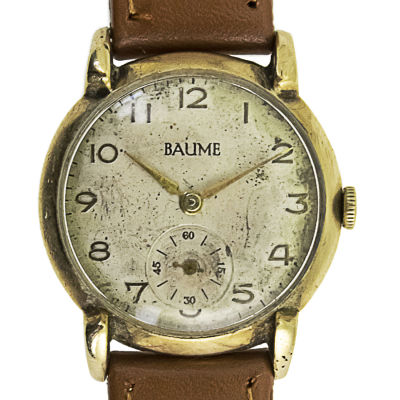 שעון יד Baume זהב 9 קראט. 
מנגנון מכני. 
מצב עבודה. 
חוגת שניות נפרדת (קצה המחוג 
