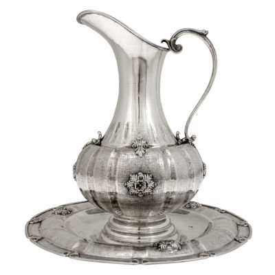 Silver Pitcher on Tray, Padua, Italy, 1944-1968. 
Floral and foliage ornaments over hammered 