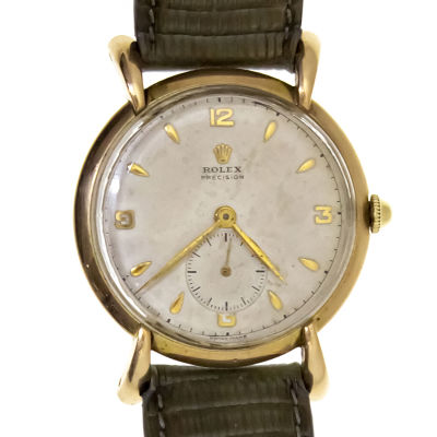 Rolex Precision 18k Gold Wrist Watch, Circa 1946. 
Mechanical movement. 
Working condition. 