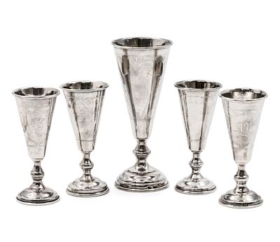 Five Russian Silver Cups, Early 20th Century.
Engraved ornaments, Two cups monogrammed.
Marked
