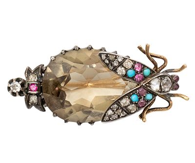 סיכת זבוב זהב 14 קראט, כסף, יהלומים, רובינים, טורקיזים וסמוקי טופז. 
21 יהלומים בחיתוך ישן, 7 