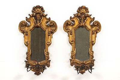 Par de placas lumin&aacute;rias de dois lumes. ENG Pair of two-light wall lamps. Shaped mirrors, with 