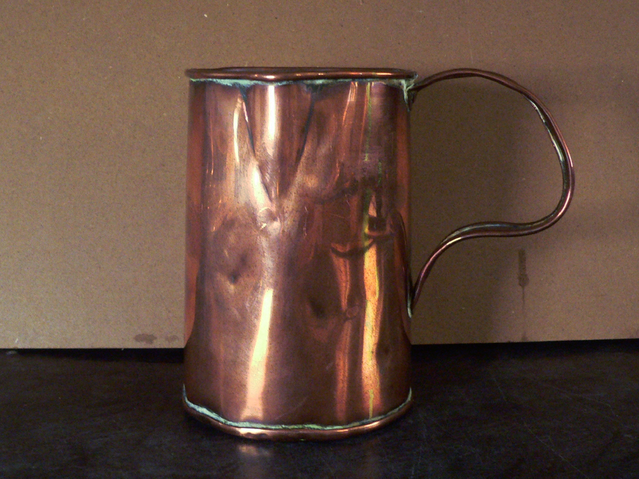 Large copper measuring jug