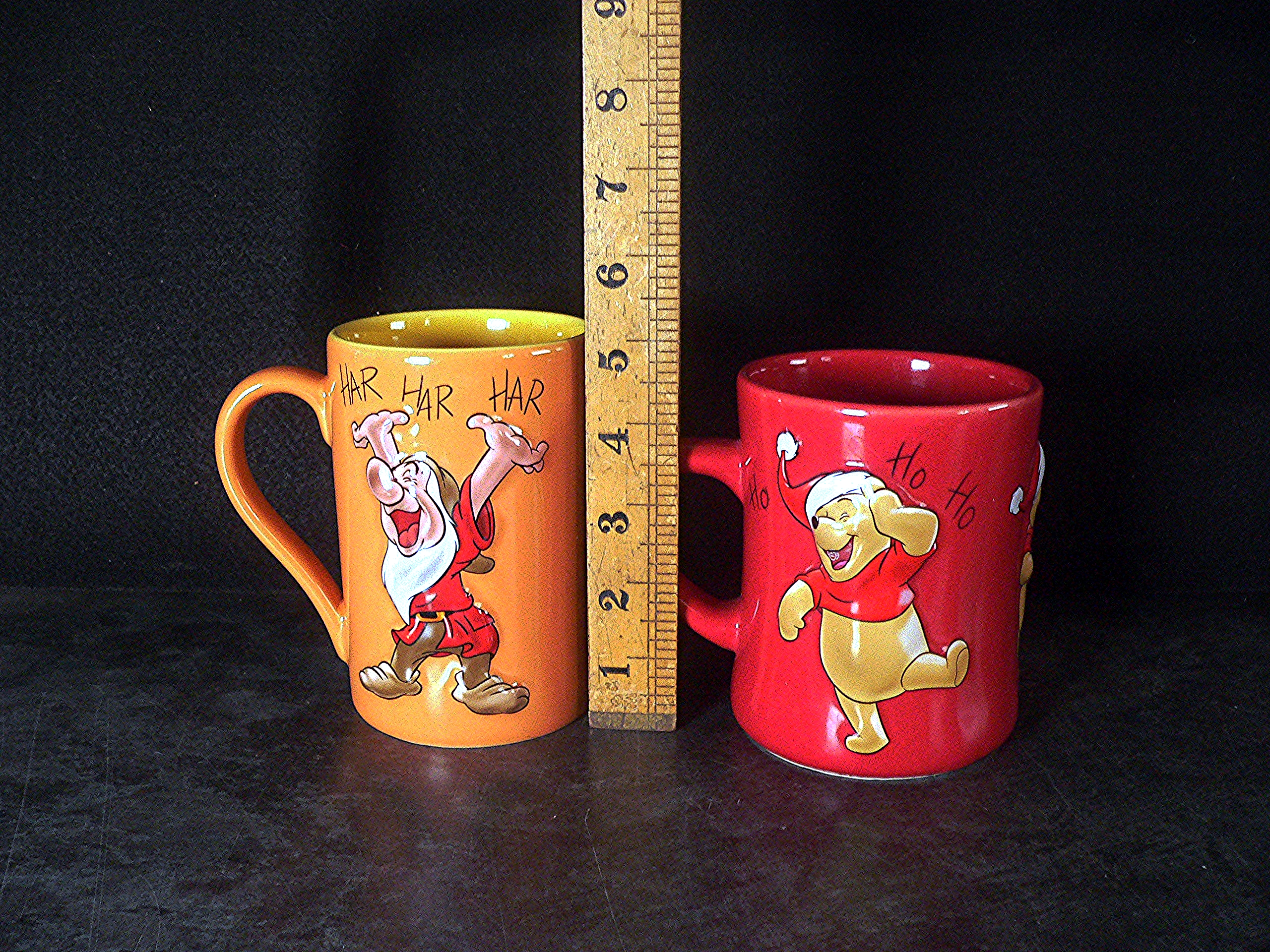 Pair of large embossed Disney mugs