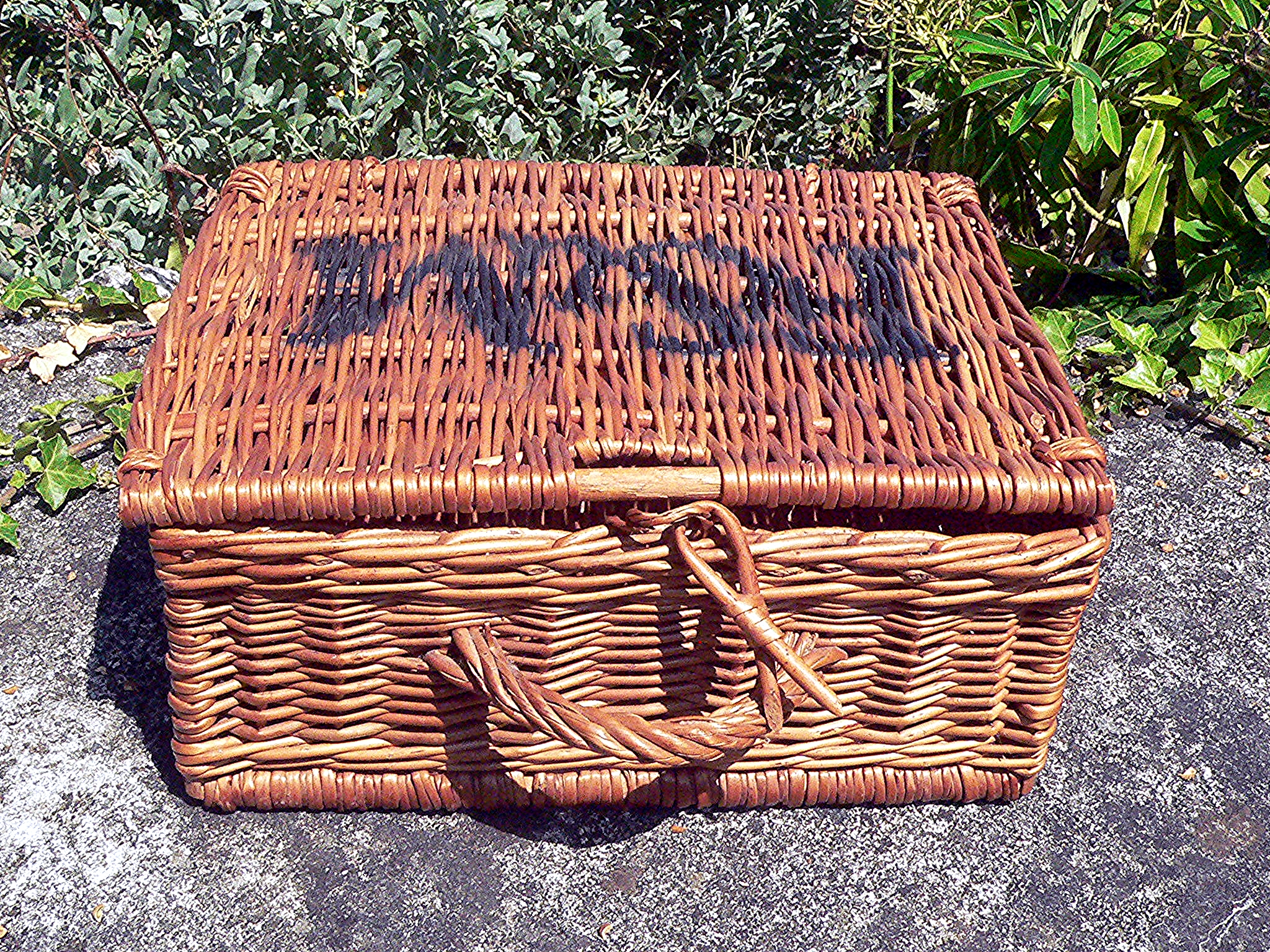 Wicker basket branded as F & M