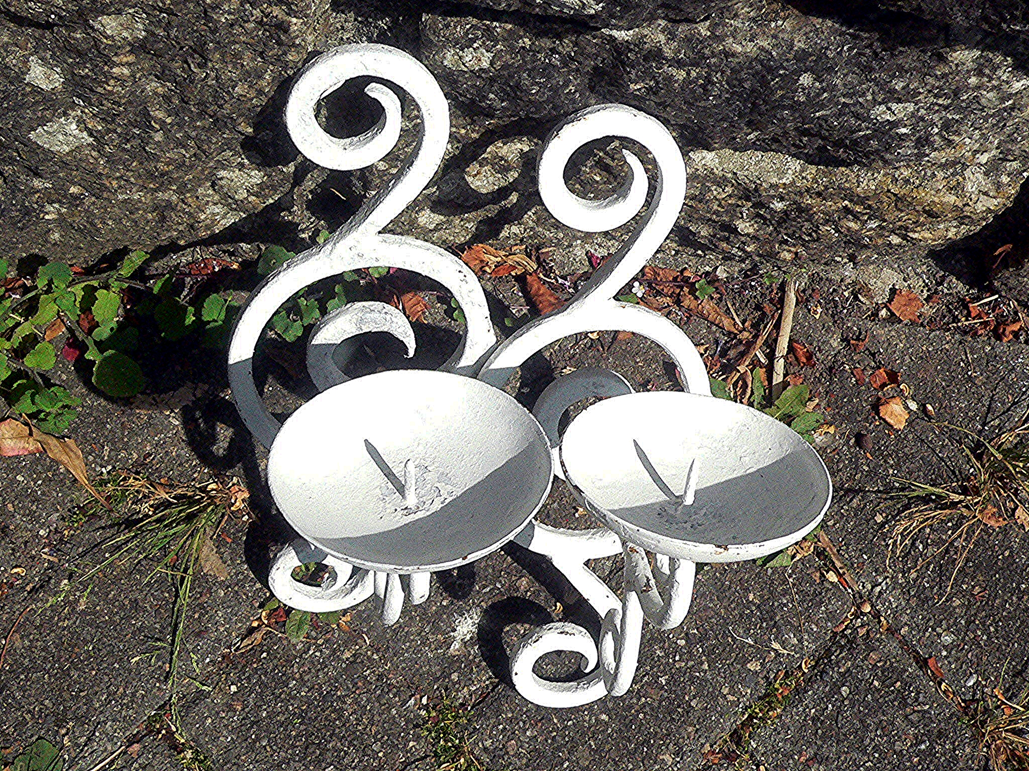 Pair of metal candle holders painted in a matt white