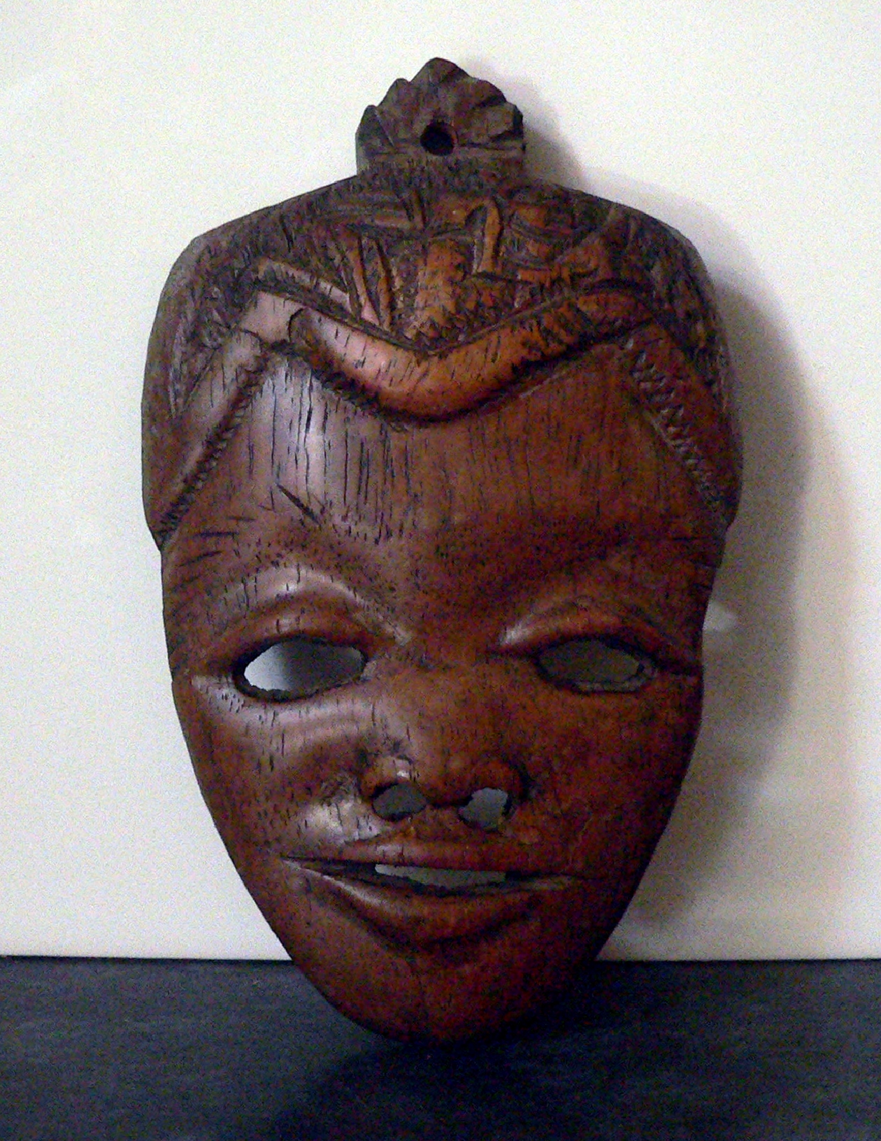 Carved wooden tribal mask