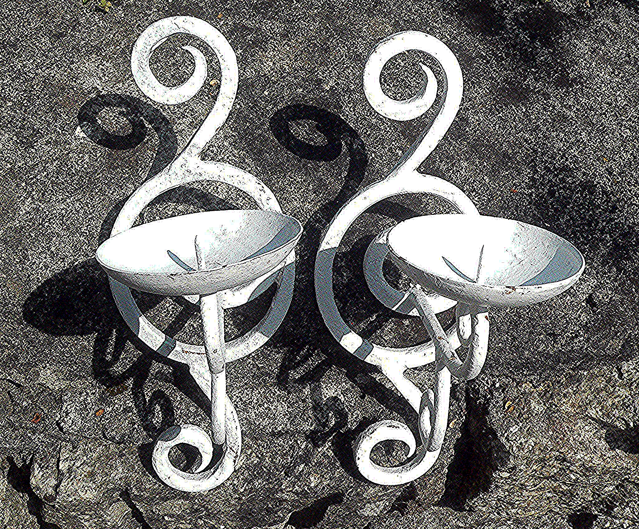 Pair of metal candle holders painted in a matt white