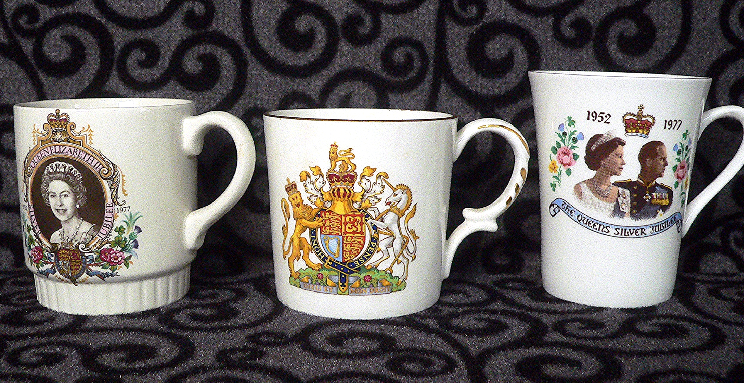 Trio of QE2 Silver Jubilee mugs including Aynsley 1977 Silver Jubilee Kings & Queens of England.