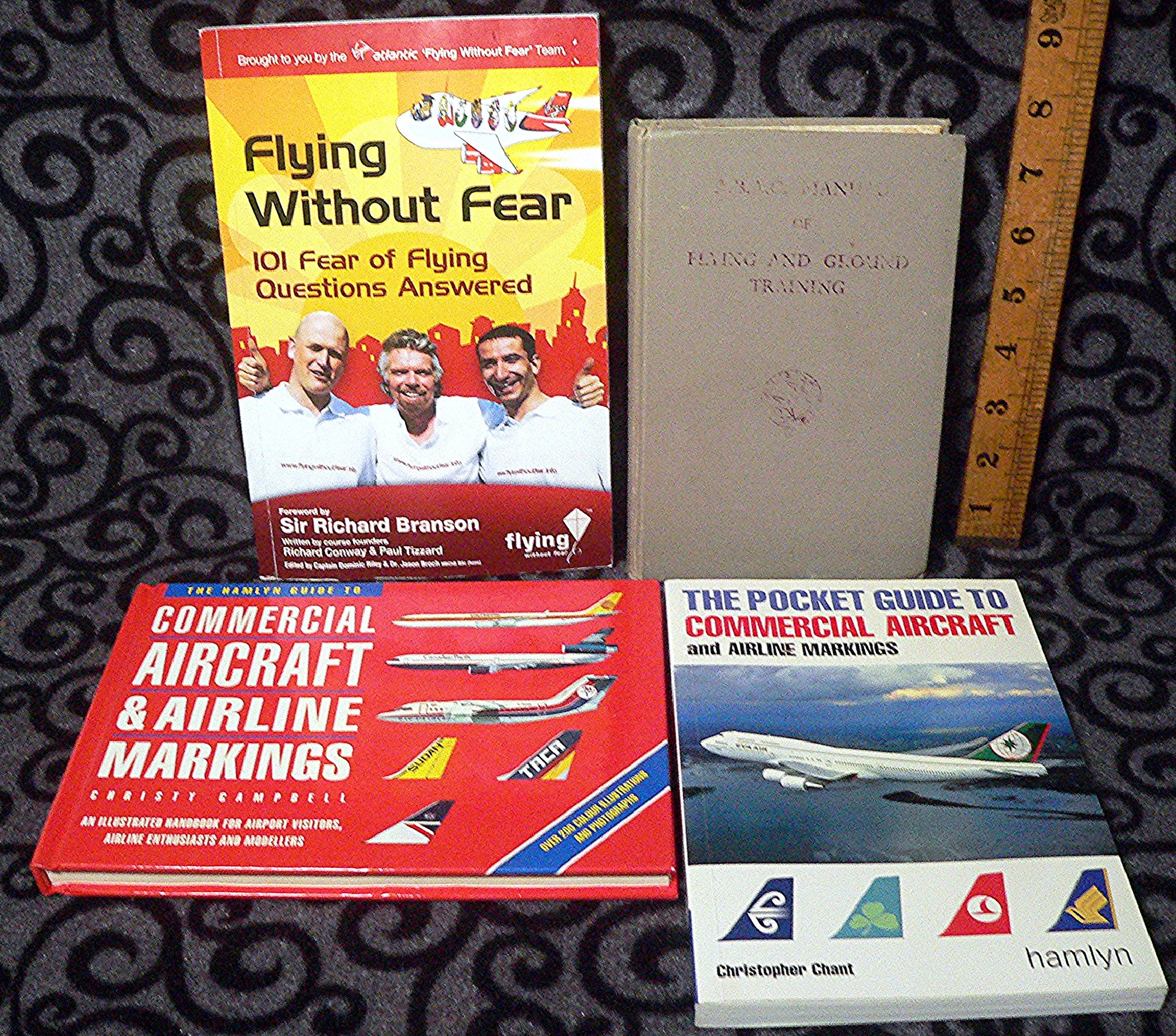 A.B.A.C 1965 Flying & Ground Training Manual and three other aviation related books.
