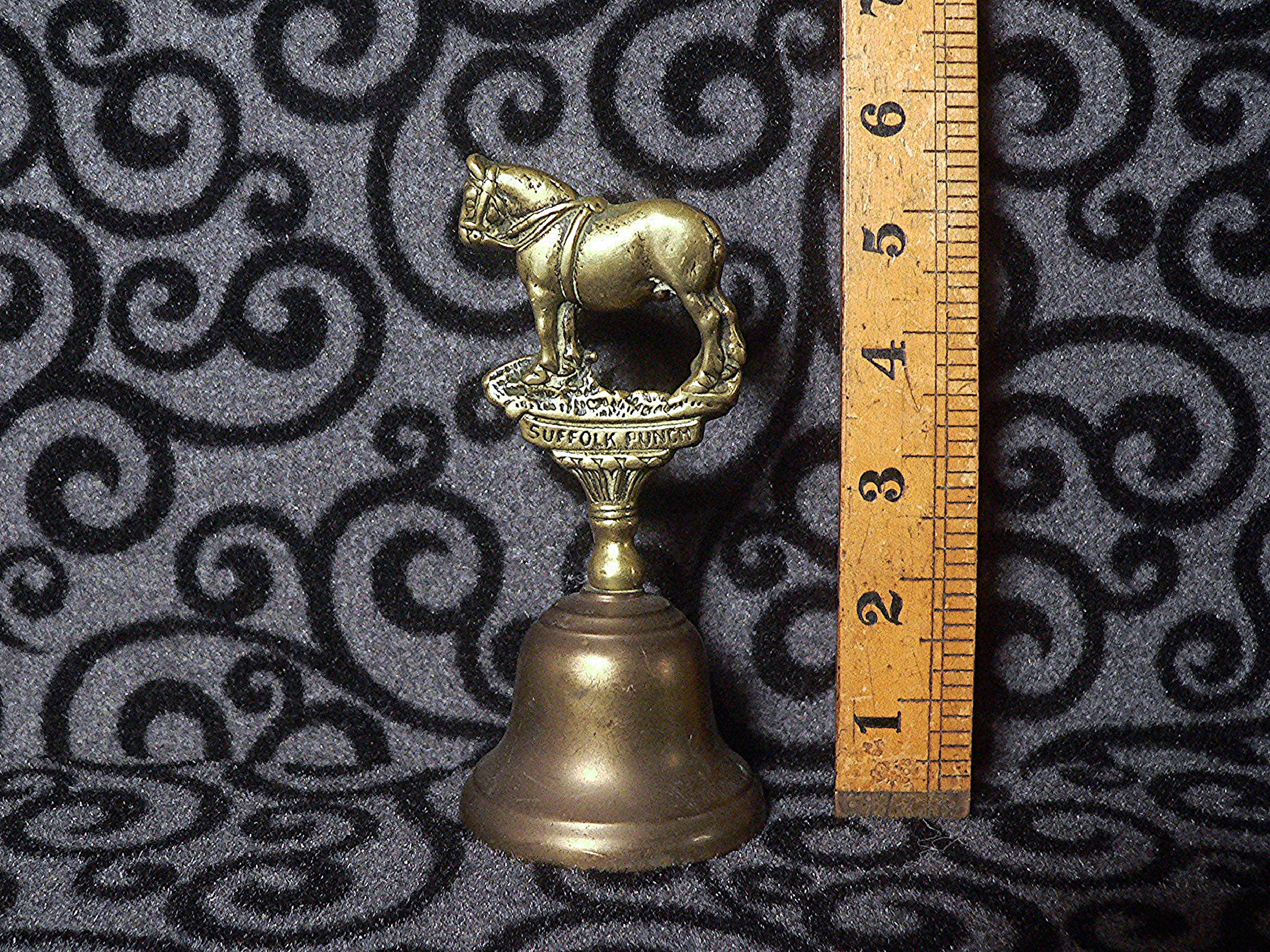 Working brass bell inscribed "Suffolk Punch."