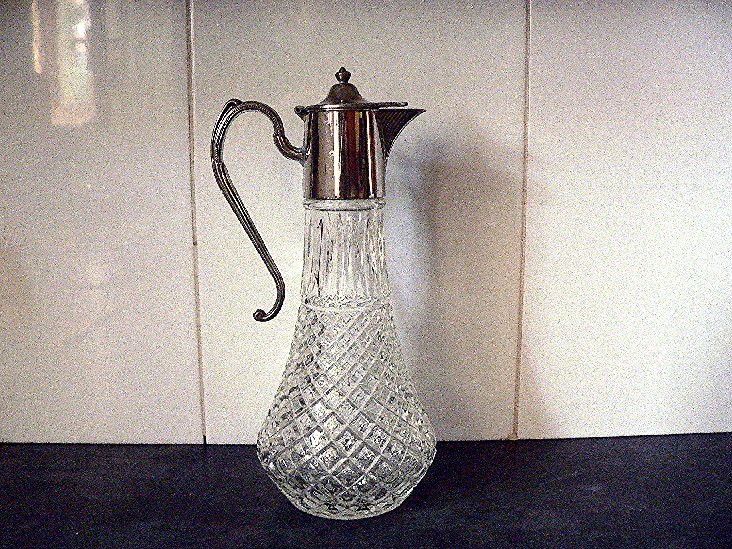 Silver plated claret jug