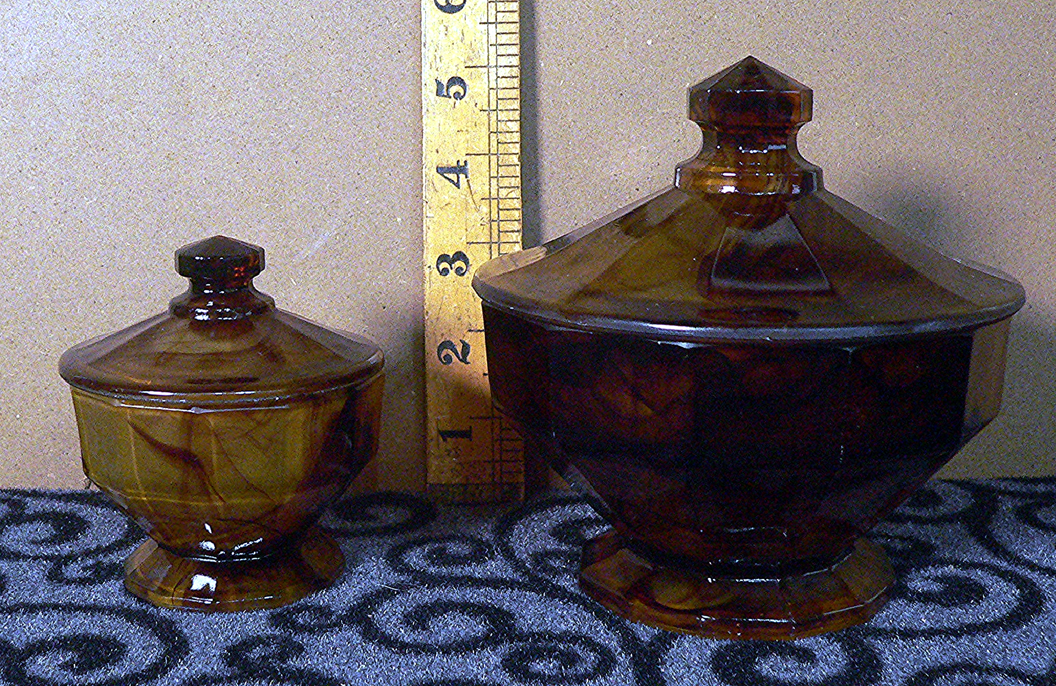 Pair of Art Deco, Davidson amber cloud glass dressing table part set.