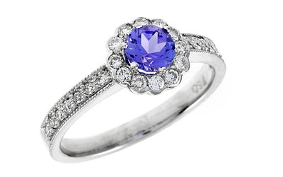 Ring 3,69g 750/- Wei&szlig;gold mit 26 Diamanten zus. ca. 0,13 ct. und Tansanit, Ringgr&ouml;&szlig;e ca. 53. Ring 