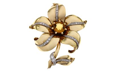 Brosche Blume 27,00g 585/- Gelbgold mit 43 Diamanten zus. ca. 0,80 ct. H/si und Citrin, mit Zerti