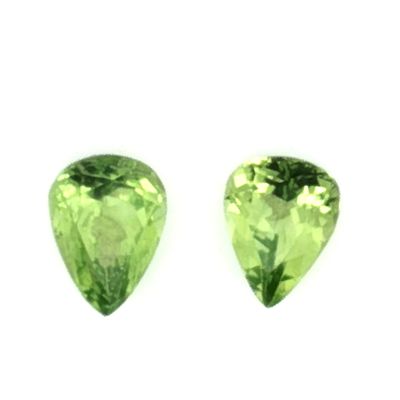 Peridot Paar 3,43 ct. 9,17 x 6,76 x 4,79 mm