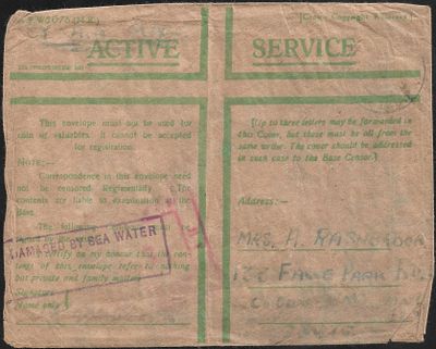 Green Honour Envelope Disaster Mail. addressed to India with unrecorded boxed cachet 'Damaged By 