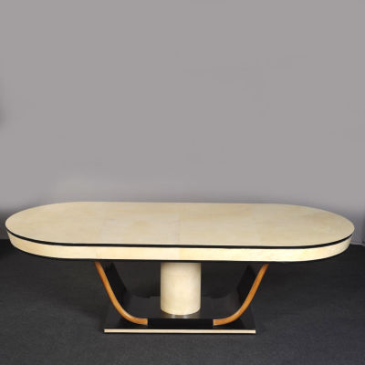 Tavolo da pranzo. "Tavolo da pranzo ovale in stile dec&ograve;, struttura in palissandro e pergamena 