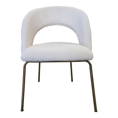 Sedia in bloucle bianco. Elegante sedia imbottita con struttura in ottone e rivestita con 
