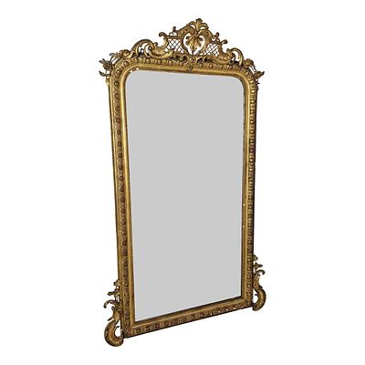 Specchio in legno epoca ‘800. Specchiera da parete in legno intagliato e dorato, stile barocco; 