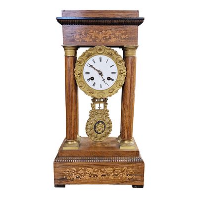 Orologio da portale, in noce intarsiato, Francia, Impero – met&agrave; XIX secolo. Orologio da portale 
