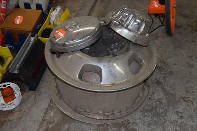 A Pair of Automotive Wheels with Three Stainless. S