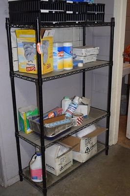 A Black Four-Tiered Powder-Coated Metal. Wire-Shelf