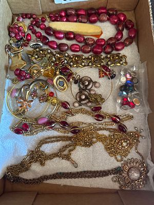 An Assortment of Vintage Costume Jewelry and Loose Stones. This collection consists of various 