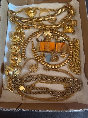 A Collection of Vintage Gold-Tone Costume Jewelry Including Trifari. A collection of vintage 