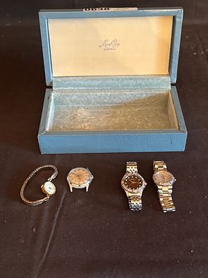 A Group of Four Citizen, Seiko, and Timex Wristwatches with a Vintage Hosiery Box. This 