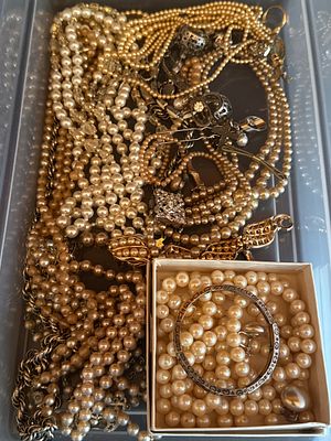 A Collection of Vintage-Style Costume Jewelry Featuring Simulated Pearl Strands and Assorted 