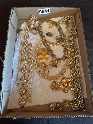 A Collection of Vintage Gold-Tone and Faux Pearl Costume Jewelry. This collection features an 