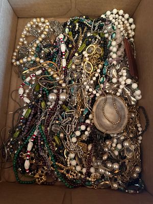 An Assortment of Vintage and Contemporary Costume Jewelry Including Beaded Strands and Pendants. 