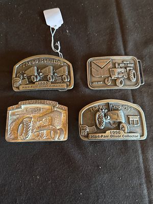 A Collection of Hart-Parr Oliver Collectors Association Commemorative Belt Buckles. A collection 
