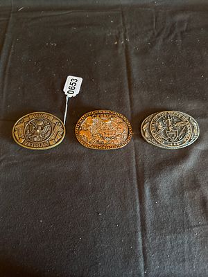 A Trio of Commemorative State and Military Metal Belt Buckles. A trio of commemorative oval 