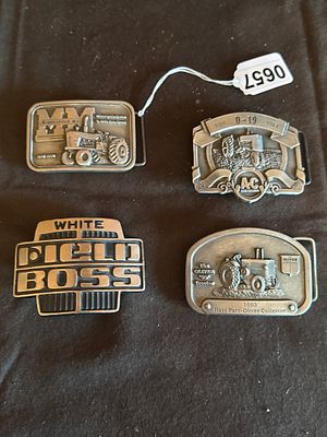 A Collection of Vintage Agricultural Machinery Cast Metal Belt Buckles. A collection of cast 