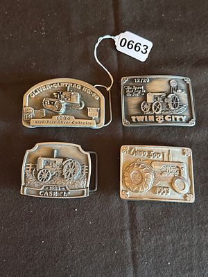 A Collection of Commemorative Cast Metal Tractor Belt Buckles. A collection of commemorative 