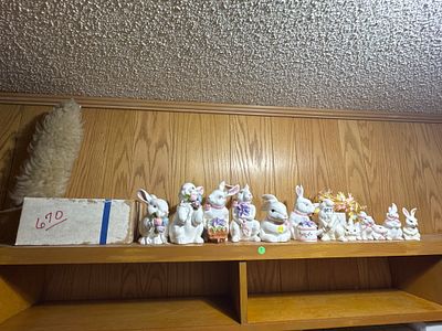 Thirteen Glazed Ceramic White Rabbit Figurines with Applied Floral Decoration. This collection 