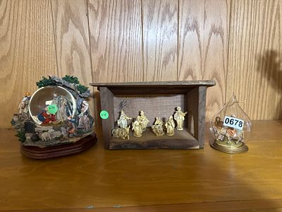 A Trio of Nativity-Themed Holiday Decorations Including a Musical Snow Globe. This collection 