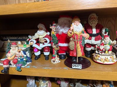 A Collection of Contemporary Santa Claus and Holiday Decorative Figurines. A group of 