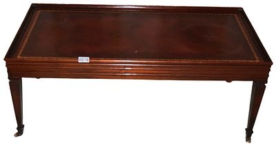 Regency Style Mahogany Coffee Table with Inset Leather Top. A Regency style coffee table of 