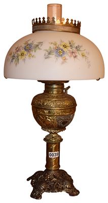 Electrified Victorian Style Brass and Cast Metal Parlor Lamp with Floral Milk Glass Shade. This 