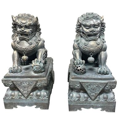 Massive Pair of Chinese Bronze Foo Dog Sculptures. A stately pair of male and female cast 